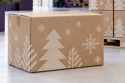 A cardboard Christmas package in a warehouse (mood image)
